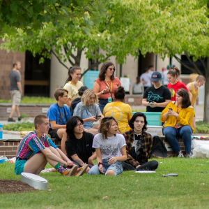 a group of people hanging out outside