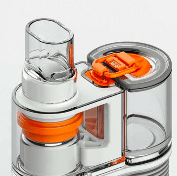 Product concept design for an air chamber with multiple white, orange, and clear plastic parts