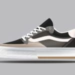 Digital rendering of a grey, tan, black and white sneaker on a grey background.