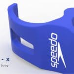 Side view of a blue concept pull buoy with a white Speedo logo.