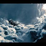 Digital rendering of a futuristic sky ship flying over clouds.