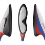 One bottom and two side views of black, white, red and blue concept luge shows.