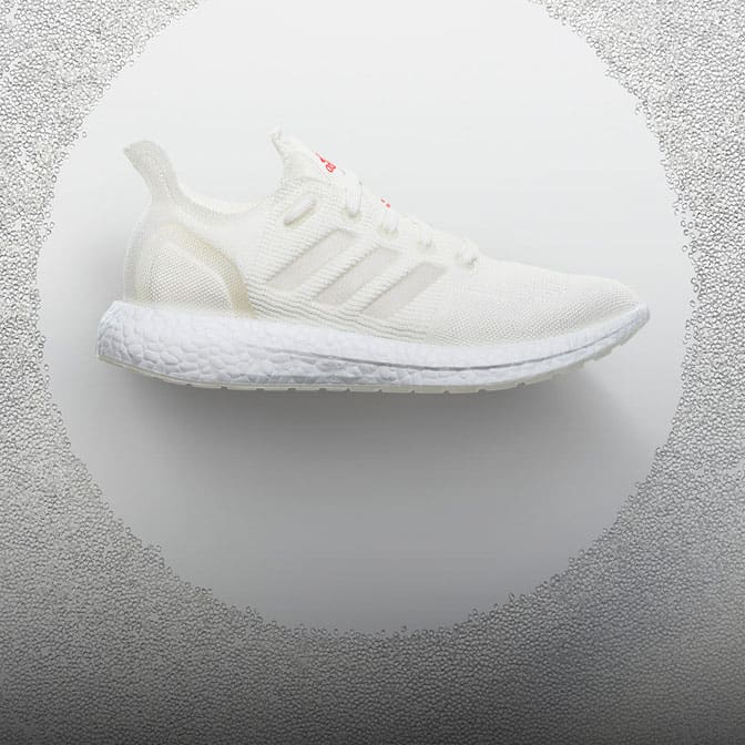 White sneaker on a white decorative background