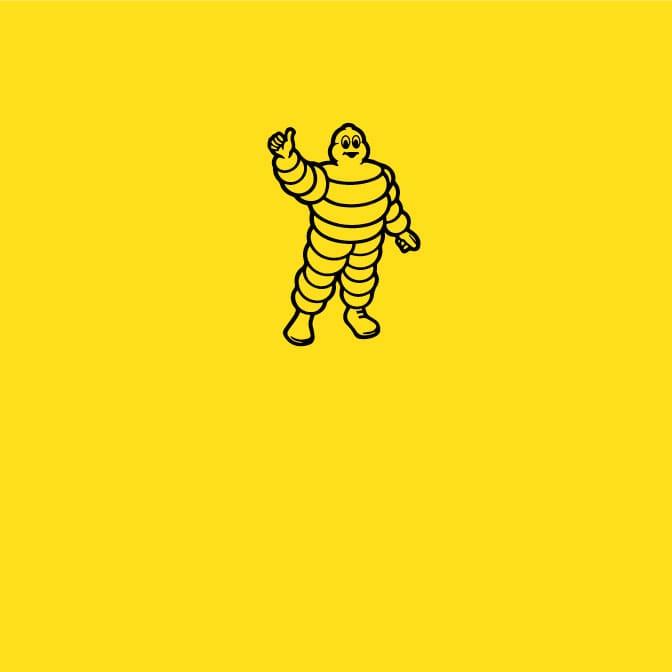 Black icon of the Michelin Tire Man on a yellow background.