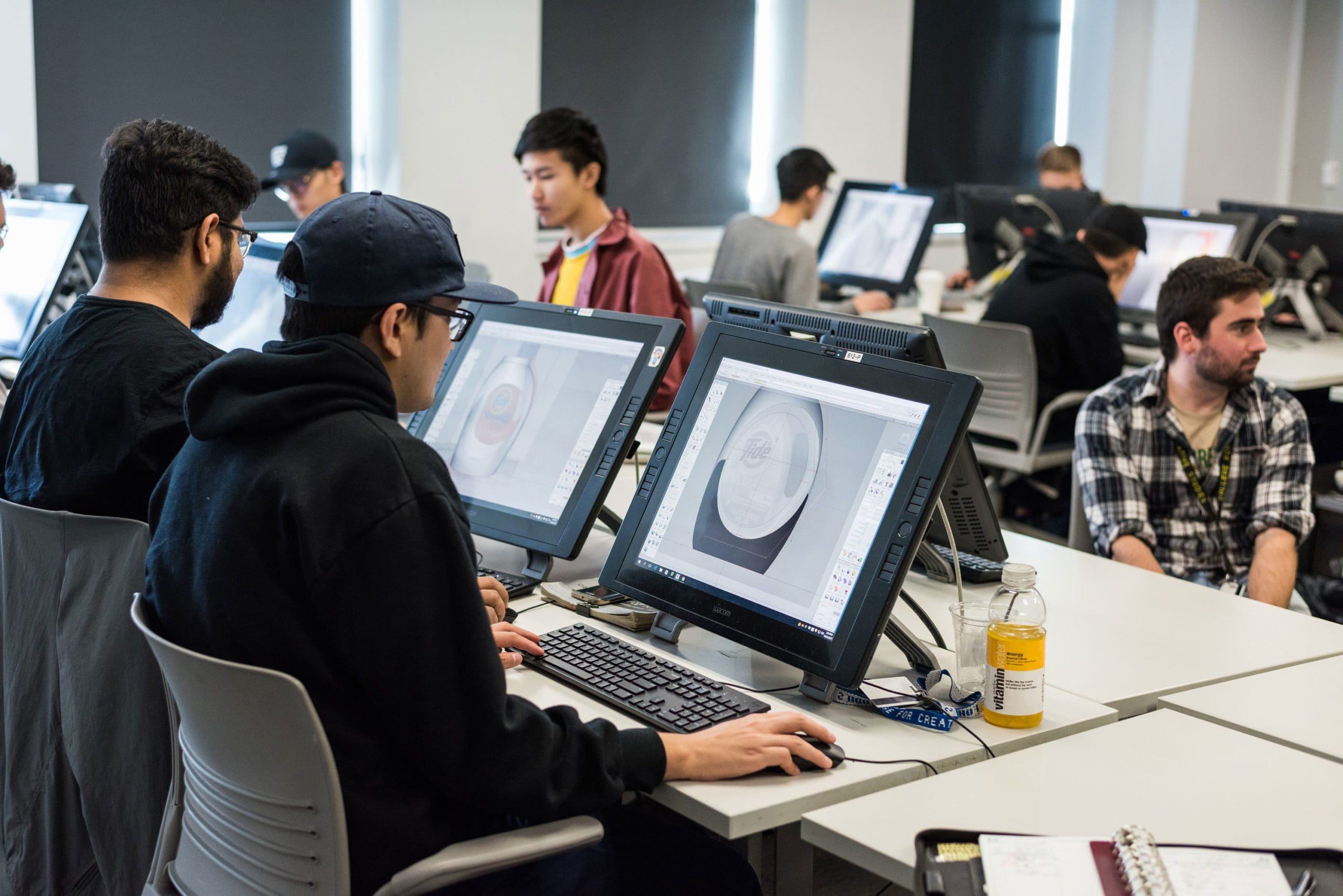 Students prototyping cars on a computer