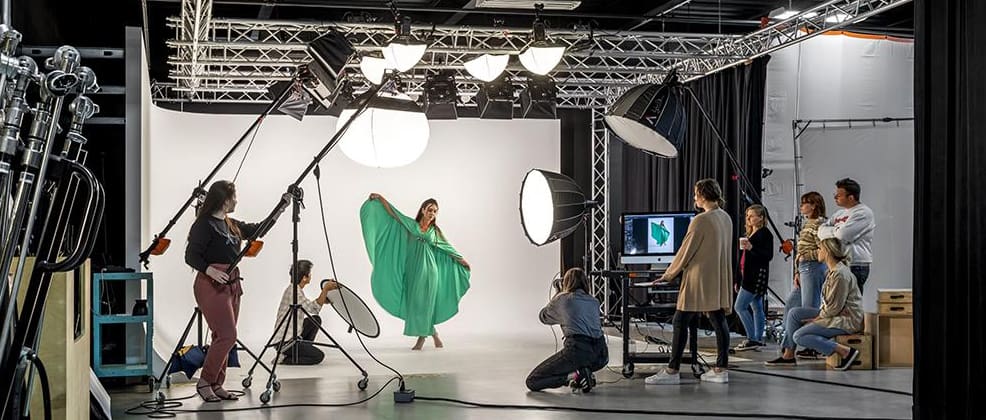 a photoshoot taking place in ccs photography department studios with a fashion model