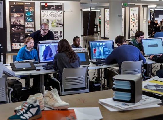 Product Design students doing work on computers in a computer lab