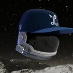 A digitally produced image of an austronaut helmet outer space with a fitted cap atop the head