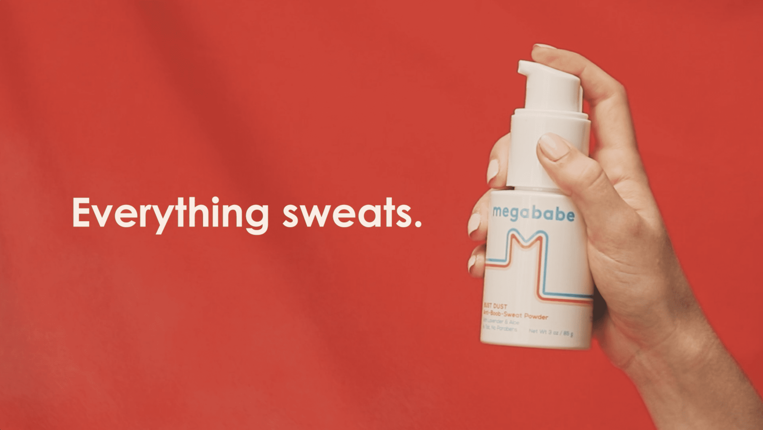 An advertisement depicting a hand against a red backdrop holding a white bottle. The bottle has two orange and blue stripes in the shape of an M on the front, below the word "Megababe" written in blue text. To the left is the phrase "Everything sweats" written in white.