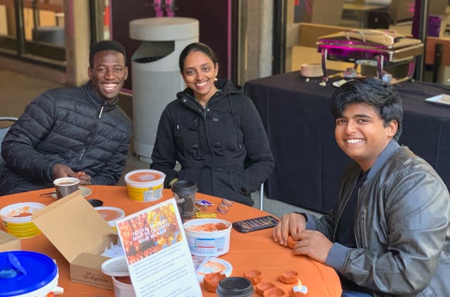 Students enjoying a fall party