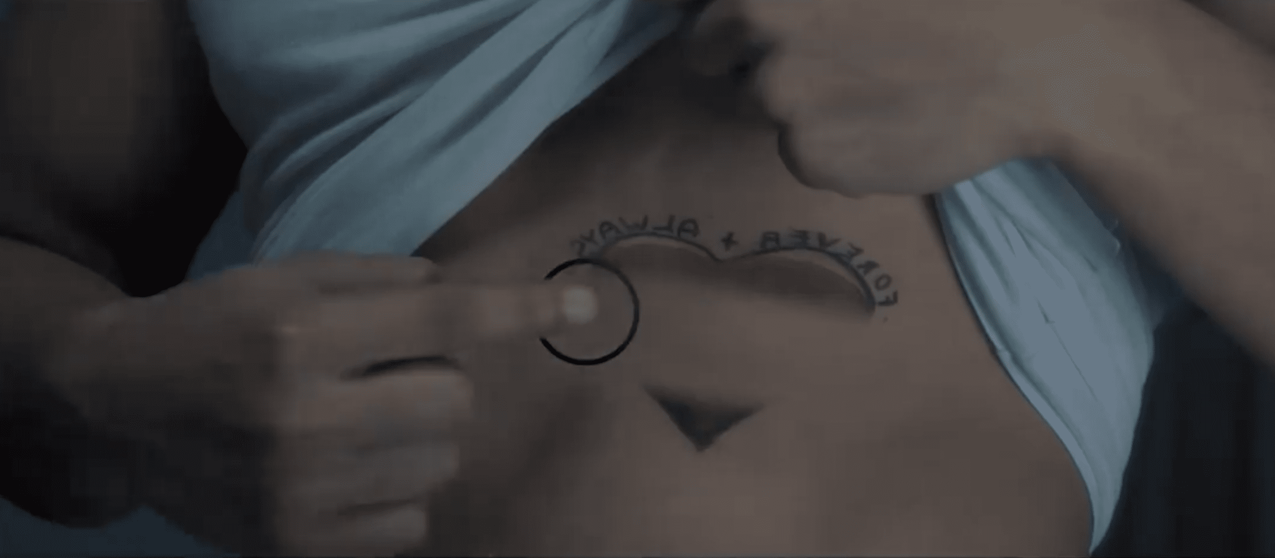 Adobe _Imagine Something Wonderful_ an artistic work depicting someone pointing to their abdomen