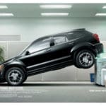 a Dodge print ad showing a dodge SUV in an office setting