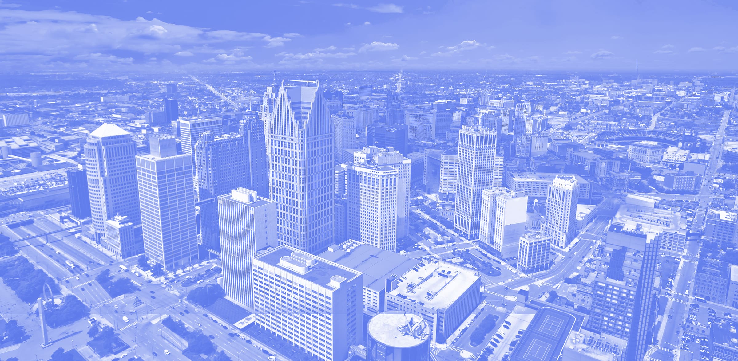 Image of detroit with a blue filter over it