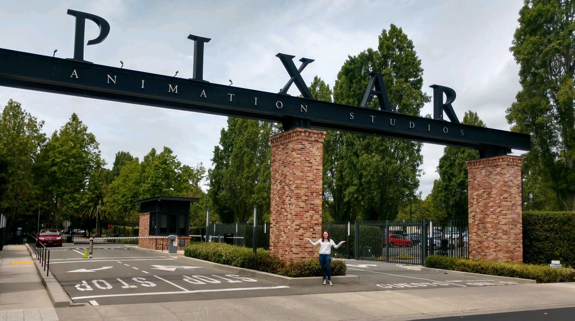 Entertainment Arts student Allison Fijalkowski standing in front of the Pixar studio headquarters