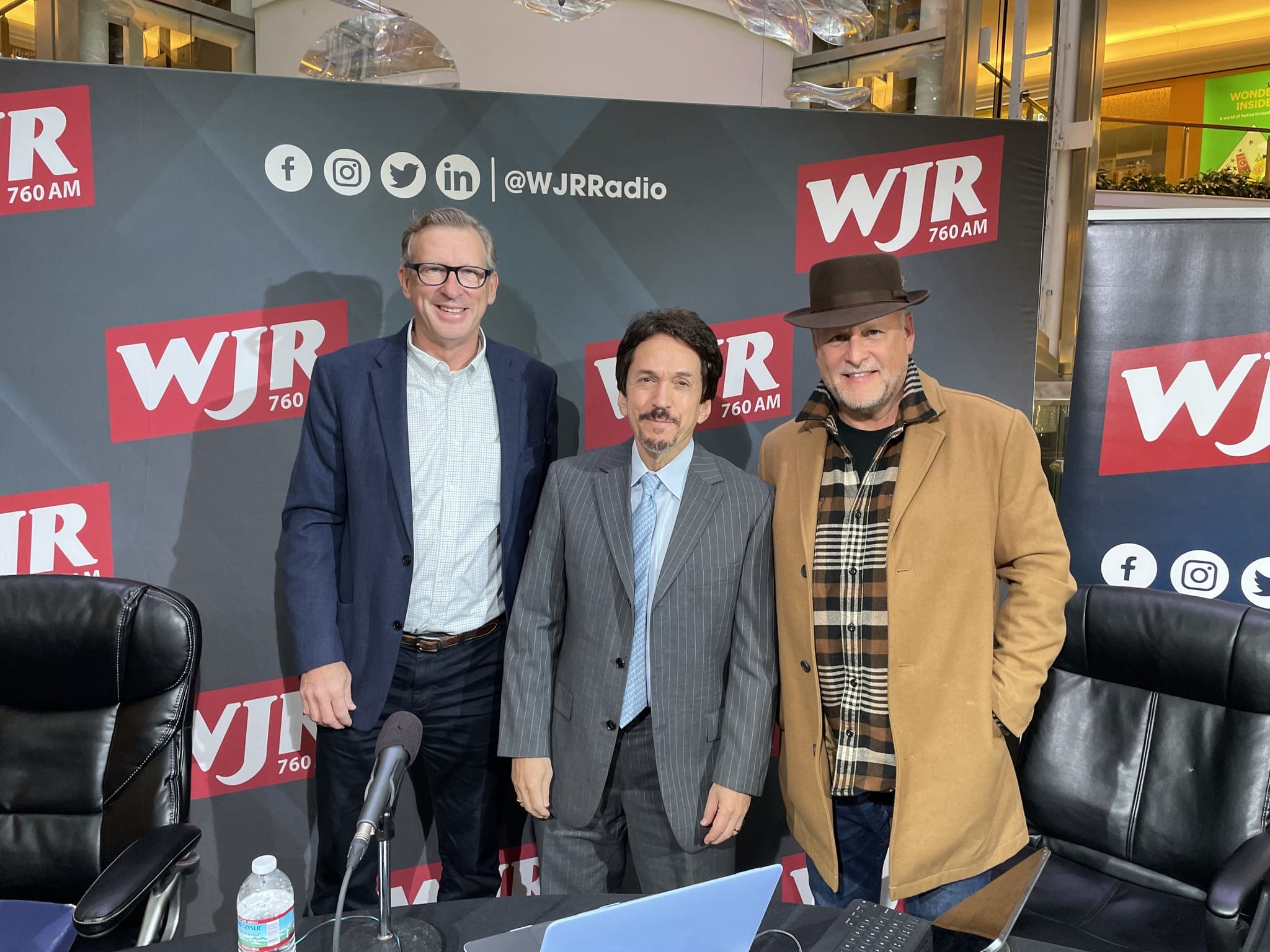 A panel of speakers at WDET speaking live on air