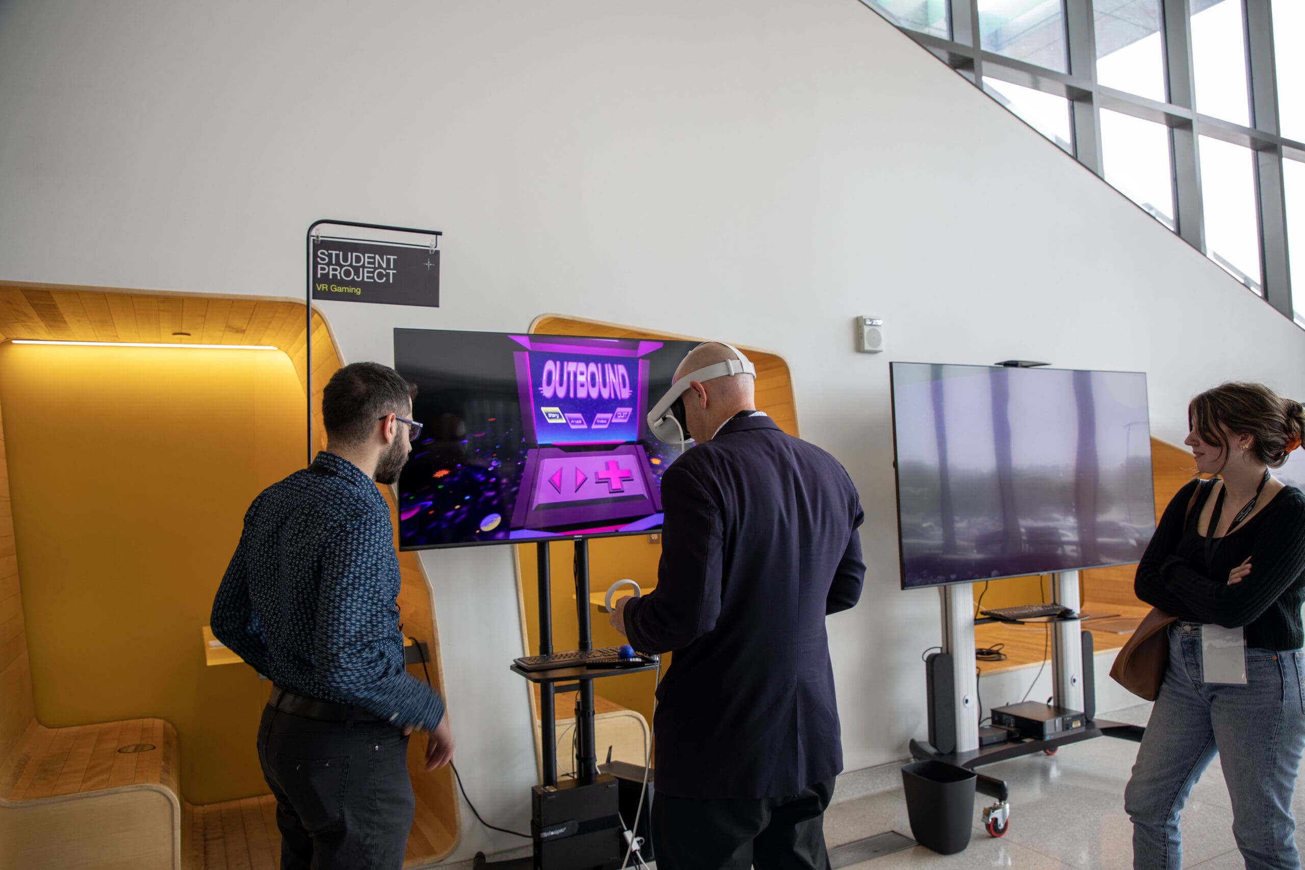 Visitors testing the outbound VR video game