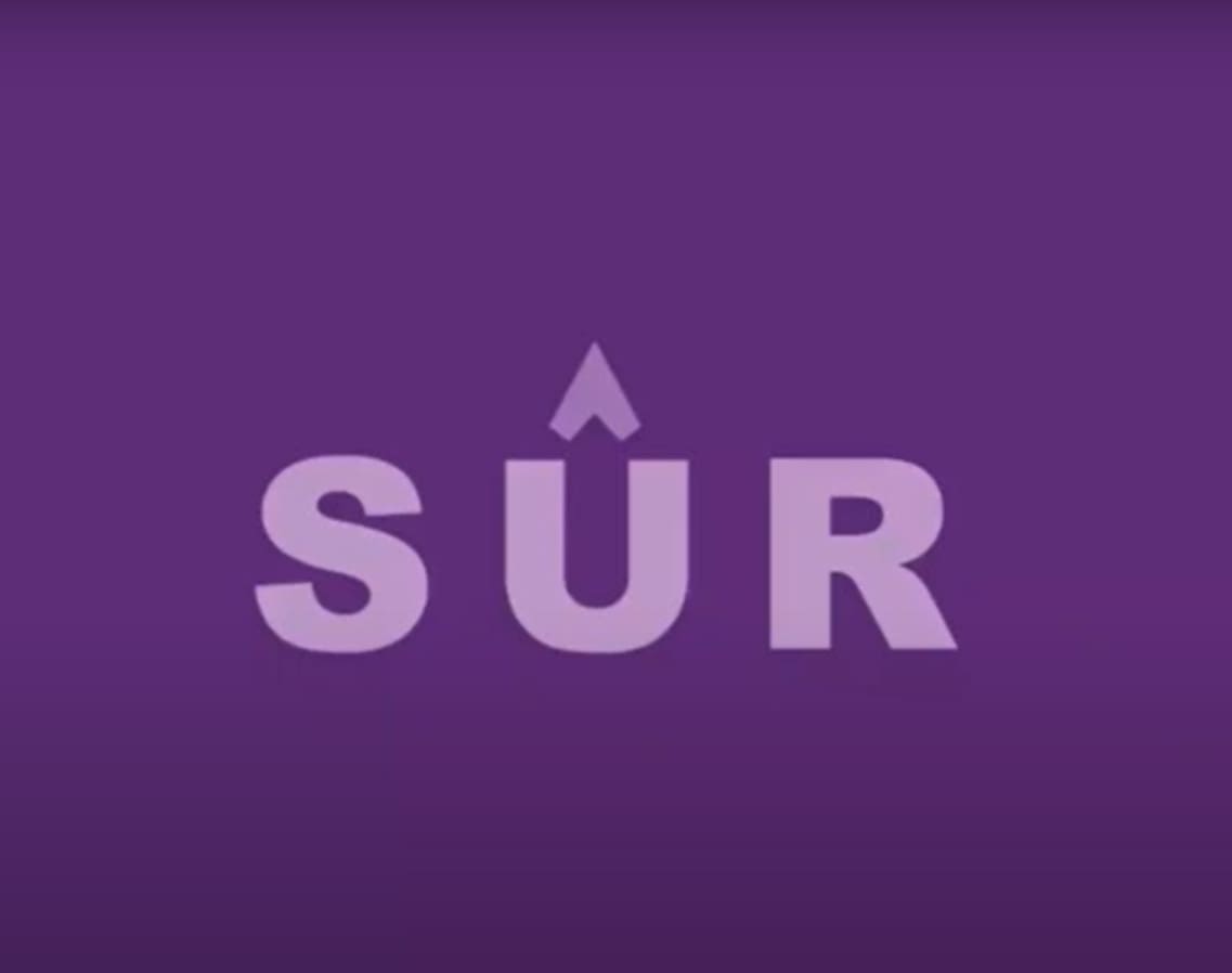 purple square with light purple writing that says Sur