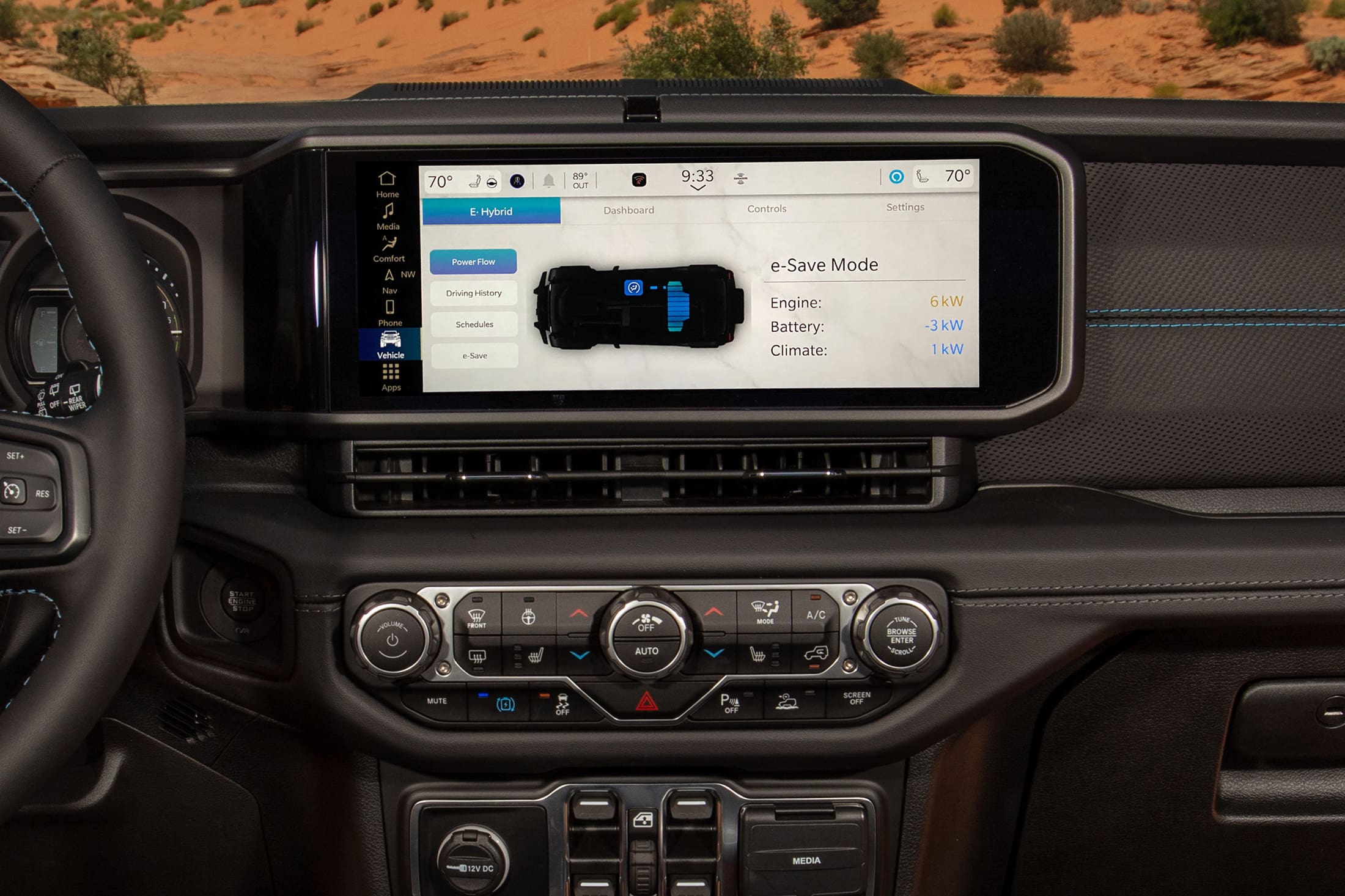 Photo of user interface screen in the front seat of a car. Display shows the stats of the car.