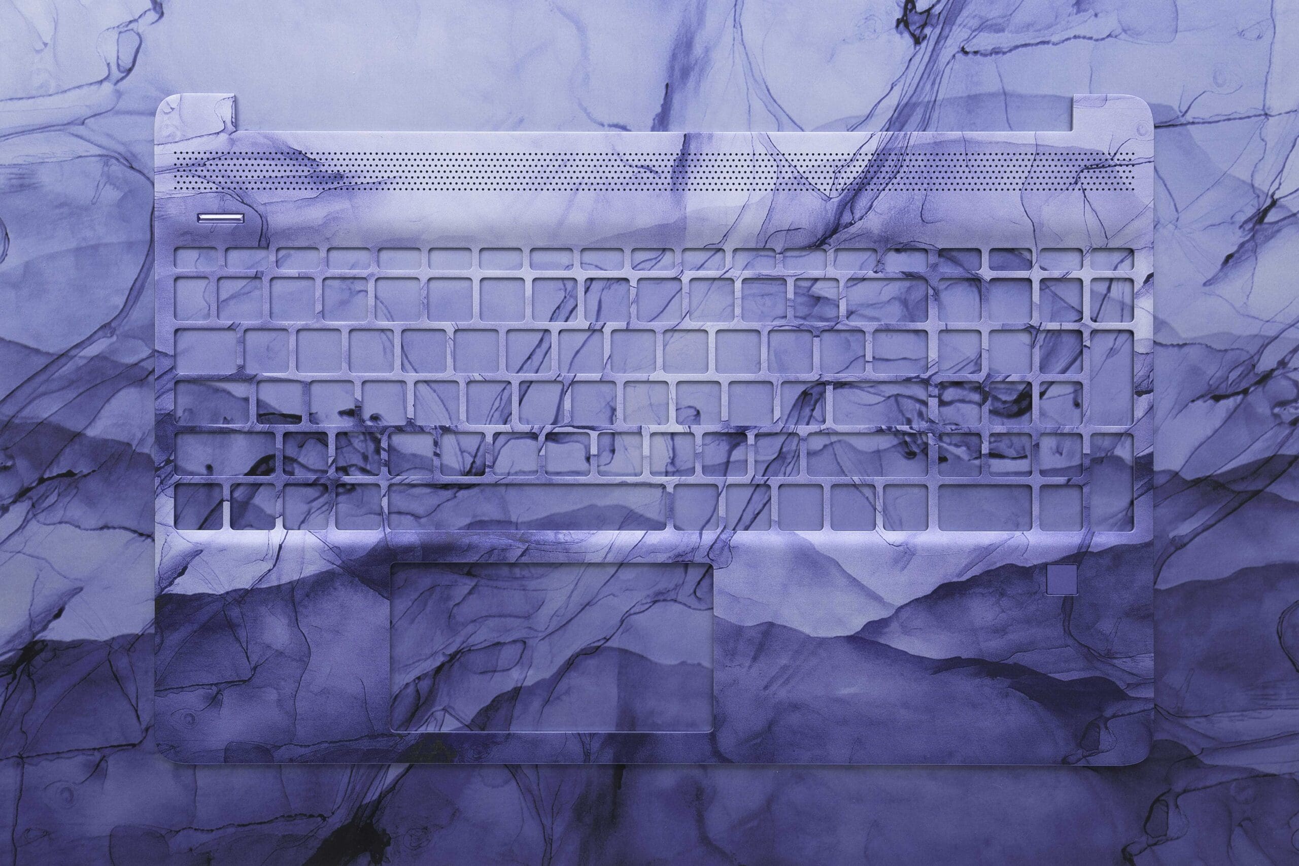 Photo of a blue marbled keyboard cover on a similar background