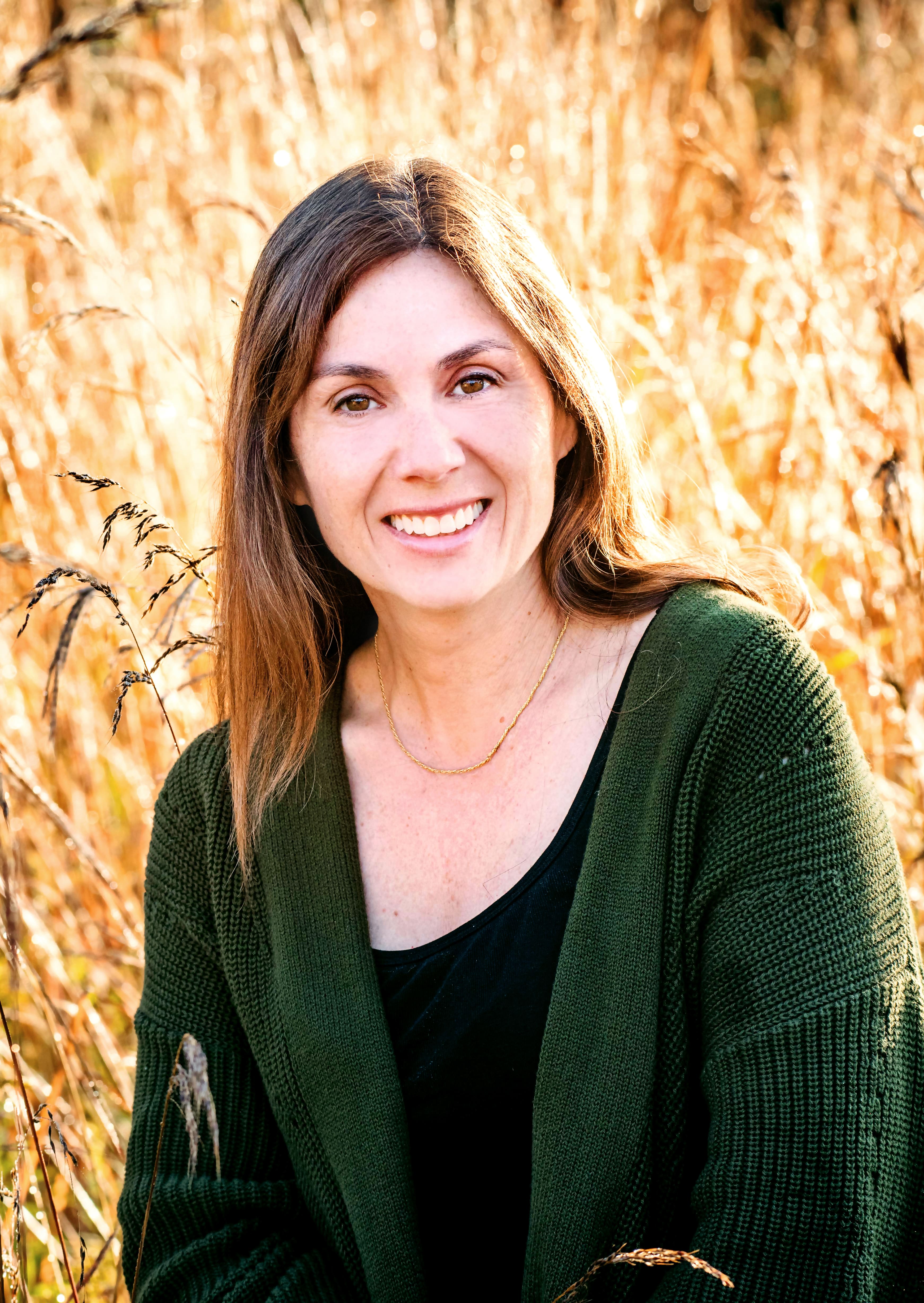 DSC_2566 Headshot of Lesley Mason in a wheat field