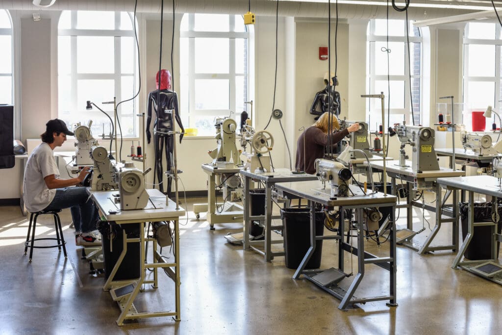 fashion design students working in the studio