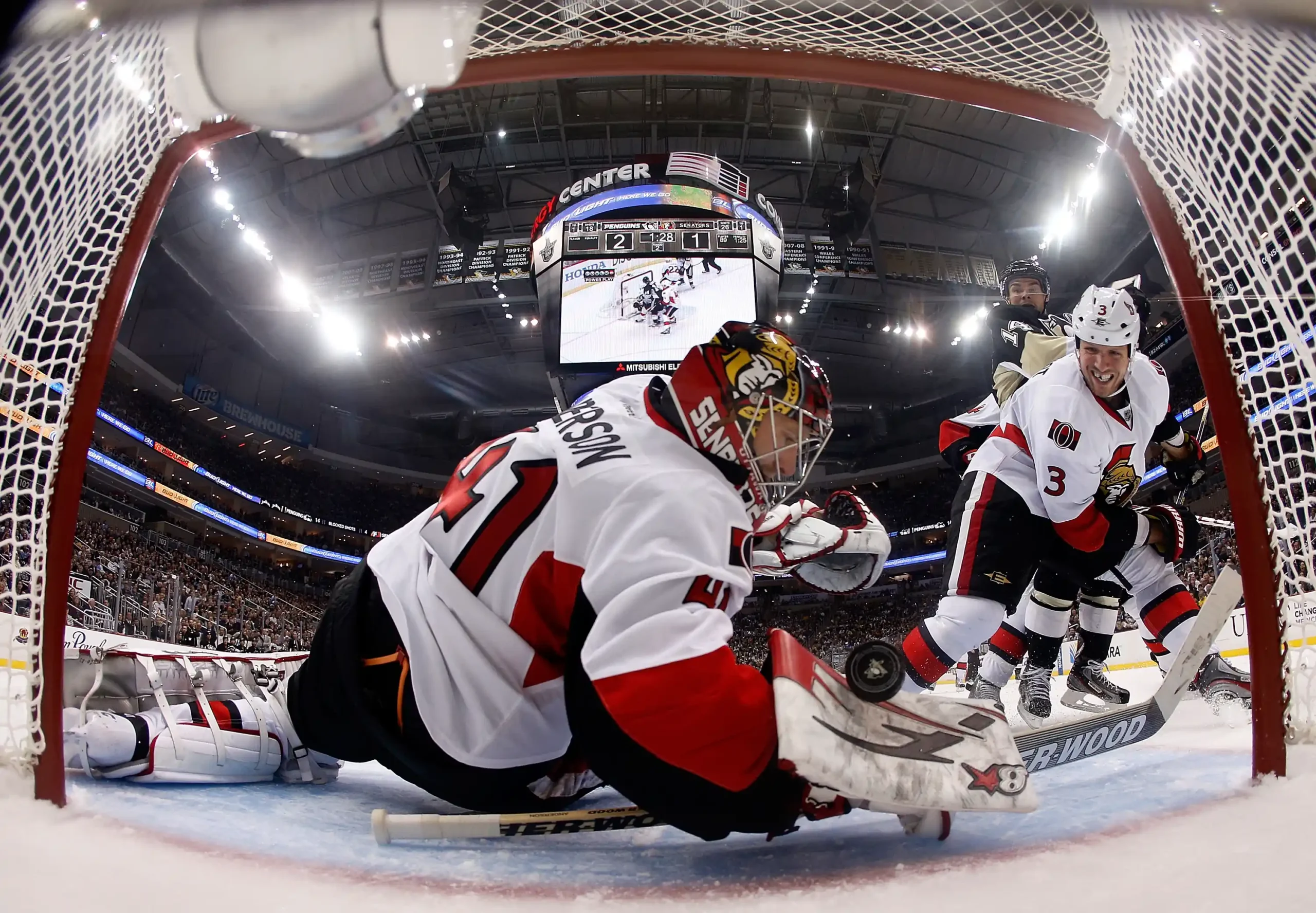 Craig Anderson #41 of the Ottawa Senators can't make a save on a shot by Chris Kunitz #14 of the Pittsburgh Penguins in Game One of the Eastern Conference Semifinals during the 2013 NHL Stanley Cup Playoffs at Consol Energy Center on May 14, 2013 in Pittsburgh, Pennsylvania.