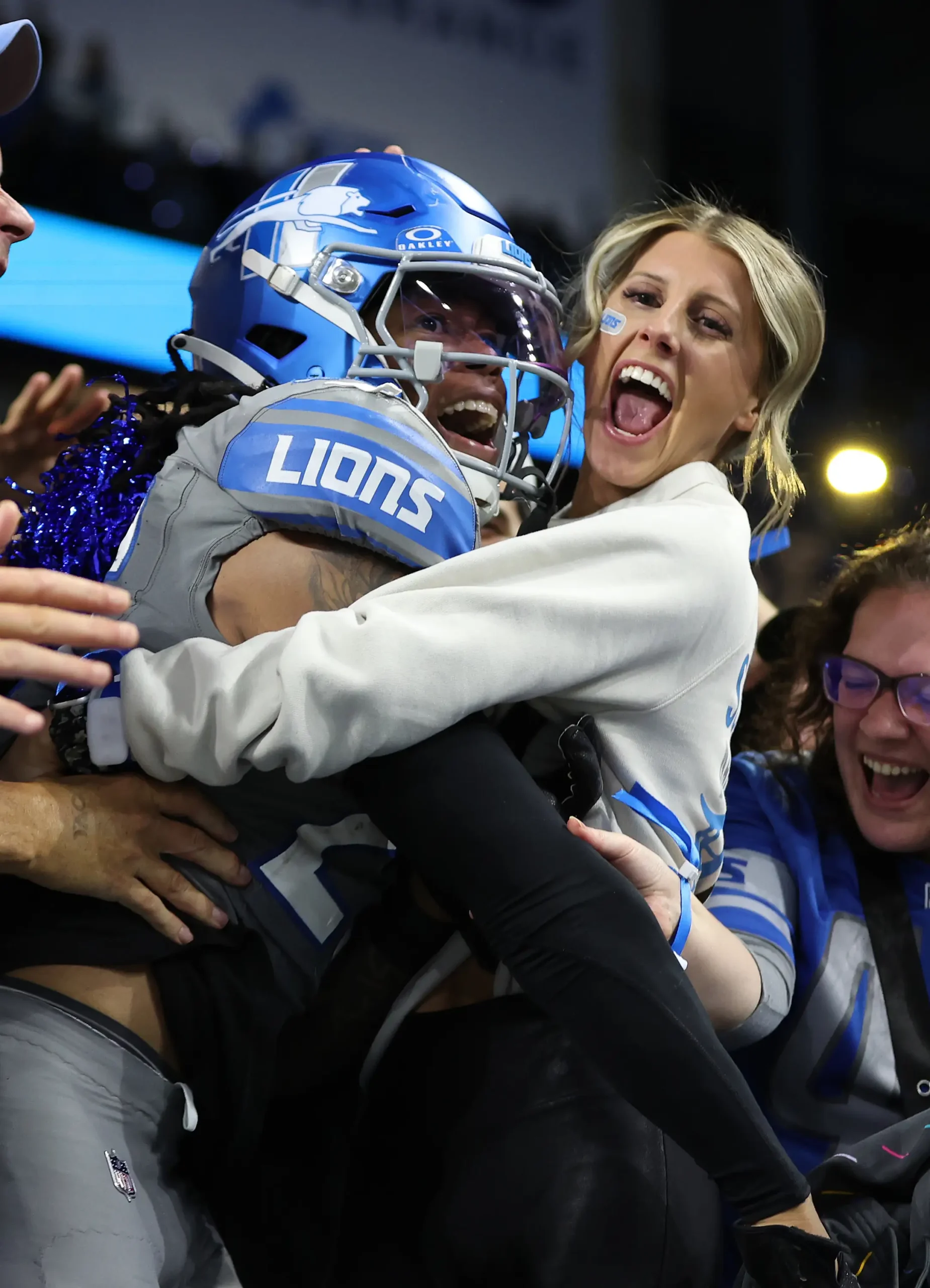 DETROIT, MICHIGAN - OCTOBER 30: Jahmyr Gibbs #26 of the Detroit Lions celebrates with fans in the front row after a touchdown against the Las Vegas Raiders at Ford Field on October 30, 2023 in Detroit, Michigan.