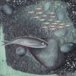 A large gray fish swimming through a dark, rocky riverbed. Above it, a small school of white fish swims in the opposite direction.