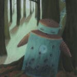 A cylindrical robot sits against a large tree in a forest.