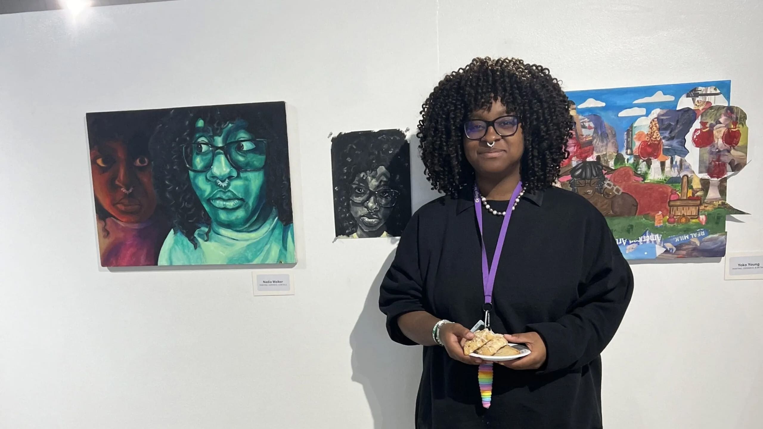 Nadia Walker in front of art.