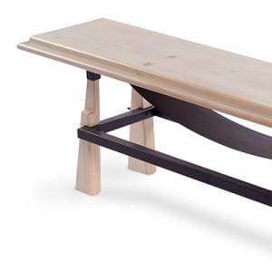 Art Furniture. A light wooden bench with black bars underneath