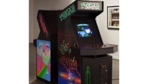 two different styled multicolored arcade games back to back