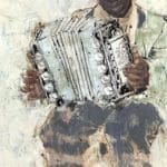 a man playing an accordion