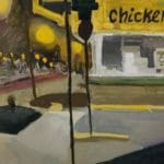 a chicken shack sign lit up in the night