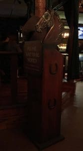 a horse themed podium with horse shoes along the the sides