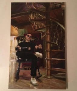 a figure sitting in a rocking chair at the bottom of a spiral staircase